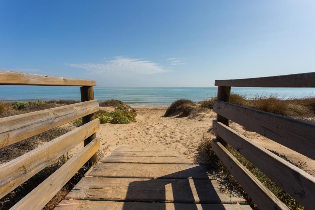 Dosel Beach Apartment Cullera Bagian luar foto