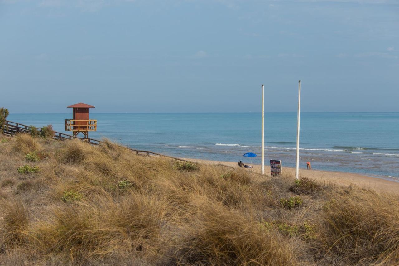 Dosel Beach Apartment Cullera Bagian luar foto